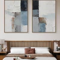 זוג תמונות קנבס מופשטות בצבעי תכלת, לבן ואפור בהדפסה חלקה – עיצוב מודרני לקיר