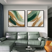 זוג תמונות קנבס מרובעות אבסטרקטיות בגווני ירוק עם נגיעות זהב