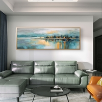 תמונת קנבס פנורמית אבסטרקטית עם קו אופק, השתקפות מים וגווני כחול, תכלת וזהב בעיצוב רגוע ויוקרתי