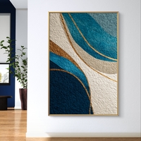 תמונת קנבס מופשטת בגווני כחול וזהב עם קווים זורמים והדפסה חלקה