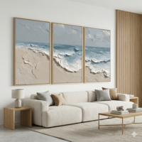 סט שלושה קנבסים עם גלי ים בגווני בז׳ ותכלת