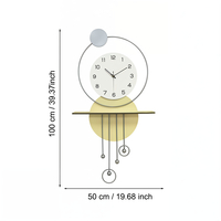 שעון קיר מעוצב בסגנון מודרני עם צורות גיאומטריות, מסגרת עגולה, מטוטלות דקורטיביות וגימור אלגנטי בגווני זהב, אפור ולבן, תלוי על קיר בעיצוב מינימליסטי.