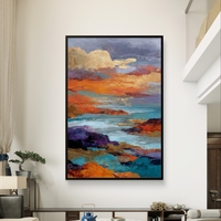 תמונת קנבס אבסטרקטית עם נגיעות זהב וגווני כחול וכתום, בהשראת ים ושקיעה בעיצוב מודרני