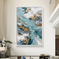 תמונת קנבס אבסטרקטית בגווני תכלת, כחול ולבן עם נגיעות זהב בעיצוב יוקרתי ואלגנטי לבית