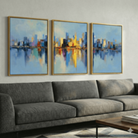 שלישיית תמונות קנבס עם נוף עירוני אבסטרקטי והשתקפות במים בגווני כחול וצהוב