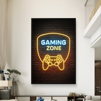 תמונת קנבס עם כיתוב Gaming Zone בעיצוב ניאון ובקר משחק על רקע כהה, מתאימה לחדר גיימינג וחדר נוער