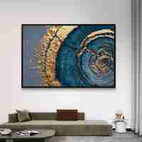 תמונת קנבס אבסטרקטית עם מעגלים בגווני כחול וזהב בהשראת חתך עץ