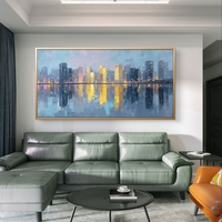 אורות העיר – תמונת קנבס קו רקיע עירוני בגווני כחול וזהב עם השתקפות מים | CK4811