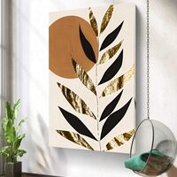 תמונת קנבס מודרנית עם איור של עלים בשחור וזהב ושמש בגוון טרקוטה מתוך קולקציית תכשיט לבית