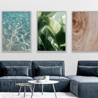 שלישיית תמונות קנבס בעיצוב טבעי – מים צלולים, עלים ירוקים ועץ בגוון בז’, מהקולקציה של תכשיט לבית, NEXTGEN BY BAR.