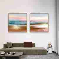 זוג תמונות קנבס מרובעות בגווני פסטל עדינים המדמים שקיעה רגועה – תכשיט לבית