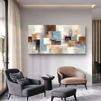 תמונת קנבס אבסטרקטית עם בלוקים בגווני תכלת, בז׳ וחום