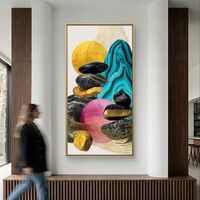 תמונת אמנות עכשווית עם אבנים מאוזנות ורקע טורקיז דרמטי.