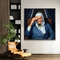 תמונת קנבס מרובעת של הבבא סאלי בצבעים כחולים עם הבעת קדושה, חלק מקולקציית תכשיט לבית.