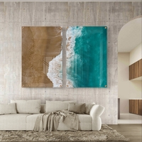 זוג תמונות זכוכית במבט על של חוף וים, מפגש בין חול חמים למים טורקיזיים בעיצוב מודרני ורגוע לקיר הבית