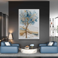 ציור עץ עדין בגווני תכלת וזהב על קנבס