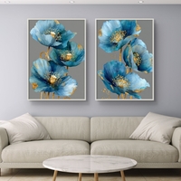 זוג תמונות קנבס פרחים כחולים עם נגיעות זהב – דגם TL8551