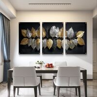 תמונת זכוכית שלשה עם עלים מוזהבים וכסופים על רקע שחור – תכשיט לבית