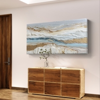 תמונת קנבס לרוחב בסגנון אבסטרקטי עם שכבות לבן ותכלת ונגיעות זהב לעיצוב סלון רגוע ויוקרתי