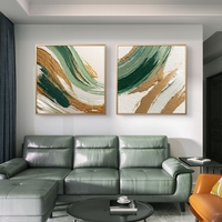 זוג תמונות קנבס מרובעות אבסטרקטיות בגווני ירוק עם נגיעות זהב