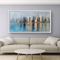 תמונת קנבס של קו רקיע מודרני המשתקף במים בגווני כחול וזהב, בהדפסה חלקה ללא תבליט.