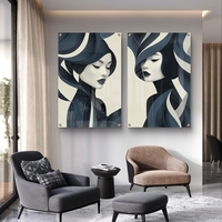 תמונת זכוכית זוגית עם דיוקנאות נשיים בעיצוב מודרני בגווני כחול ואפור