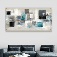 תמונת זכוכית לרוחב עם ריבועים אבסטרקטיים בגווני שחור, אפור וטורקיז על רקע בהיר – תכשיט לבית