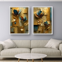 זוג תמונות קנבס פרחוניות בגווני זהב וכחול – דגם DA2223