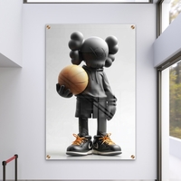 תמונת זכוכית של דמות KAWS שחורה מחזיקה כדורסל, עם נעליים שחורות ושרוכים כתומים – מתוך קולקציית NEXTGEN BY BAR של תכשיט לבית.