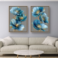 זוג תמונות קנבס פרחים כחולים עם נגיעות זהב – דגם TL8551