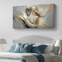 תמונת קנבס זוג רומנטי באפור וזהב עם תנועת מכחול רכה ונגיעות מטאליות