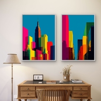זוג תמונות קנבס אורבניות של ניו־יורק בצבעי ניאון חזקים על רקע כחול – NEXTGEN BY BAR