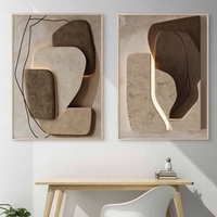 זוג תמונות קנבס בעיצוב מודרני בגווני בז' וחום עם קווים מינימליסטיים – מתוך קולקציית NEXTGEN BY BAR של תכשיט לבית.