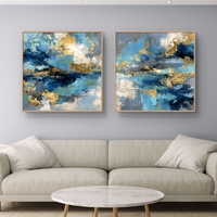 זוג קנבסים מרובעים אמנות מודרנית עם אפקט זהב וכחול עמוק