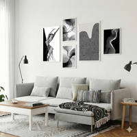סט קנבס של חמש תמונות אבסטרקטיות בשחור ולבן בעיצוב מודרני ומינימליסטי