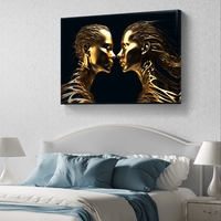 תמונת קנבס לרוחב עם שתי דמויות זהובות סימטריות על רקע שחור בעיצוב מודרני ויוקרתי