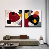 זוג תמונות קנבס מרובעות בסגנון אבסטרקט מודרני בגווני אדום, שחור וצהוב – תכשיט לבית