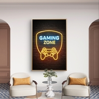 תמונת קנבס עם כיתוב Gaming Zone בעיצוב ניאון ובקר משחק על רקע כהה, מתאימה לחדר גיימינג וחדר נוער