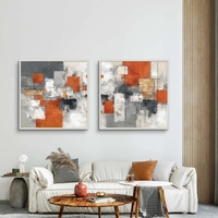 זוג תמונות אבסטרקט מרובעות עם קווים אדריכליים ובלוקים צבעוניים