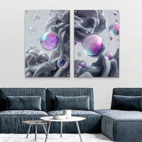 זוג תמונות זכוכית מעוצבות עם בועות שקופות בגווני סגול וטורקיז מעל רקע אפור רך בעיצוב מודרני ויוקרתי מבית תכשיט לבית – NEXTGEN BY BAR.