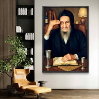 תמונת קנבס אומנותית של הבבא סאלי יושב ליד שולחנו, עם ספר קדוש פתוח, כוס קידוש ונרות ברקע. יצירה המשדרת קדושה, חוכמה וברכה, מתאימה לבית יהודי, בתי כנסת וחללים רוחניים.