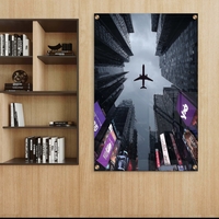 תמונת זכוכית של מטוס חולף מעל גורדי שחקים במראה אורבני דרמטי – NEXTGEN BY BAR