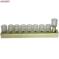 Gold tin menorah with glass cups