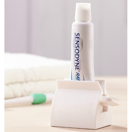 מעמד סוחט משחת שיניים מתגלגל