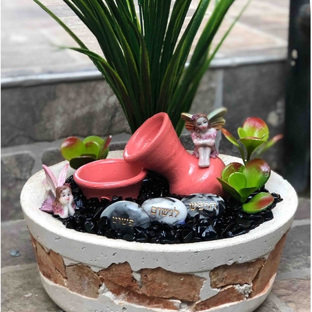 מפל מים עם אוניקס מוחלק בקערה עגולה