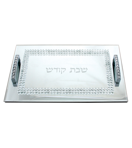 A challah tray set with stones