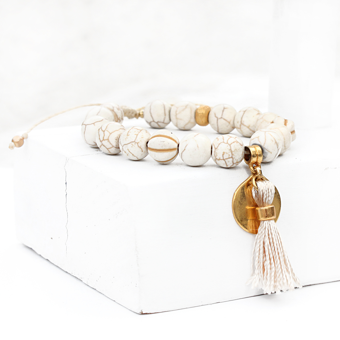 צמיד גדיל אבנים - שמנת, זהב