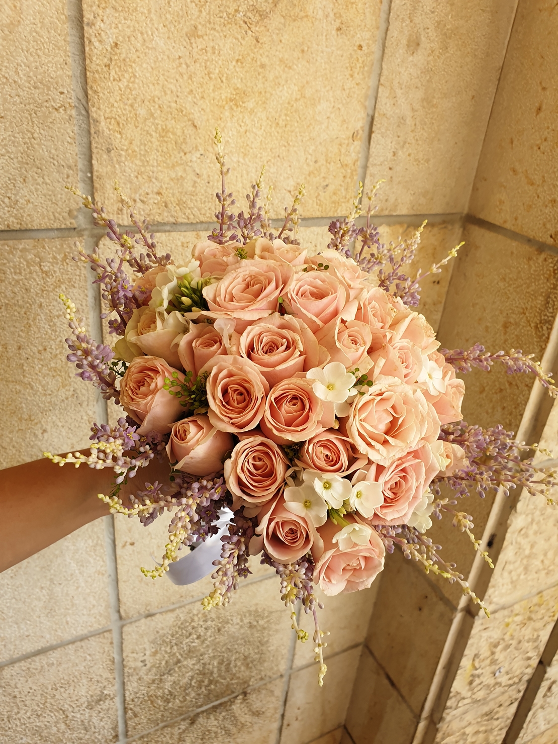 Pink bridal bouquet with roses