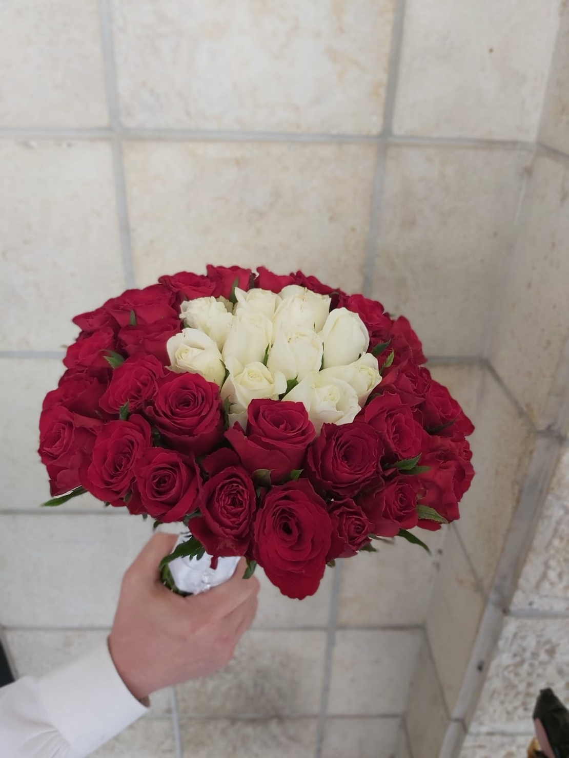 The pomander bridal bouquet in white and red