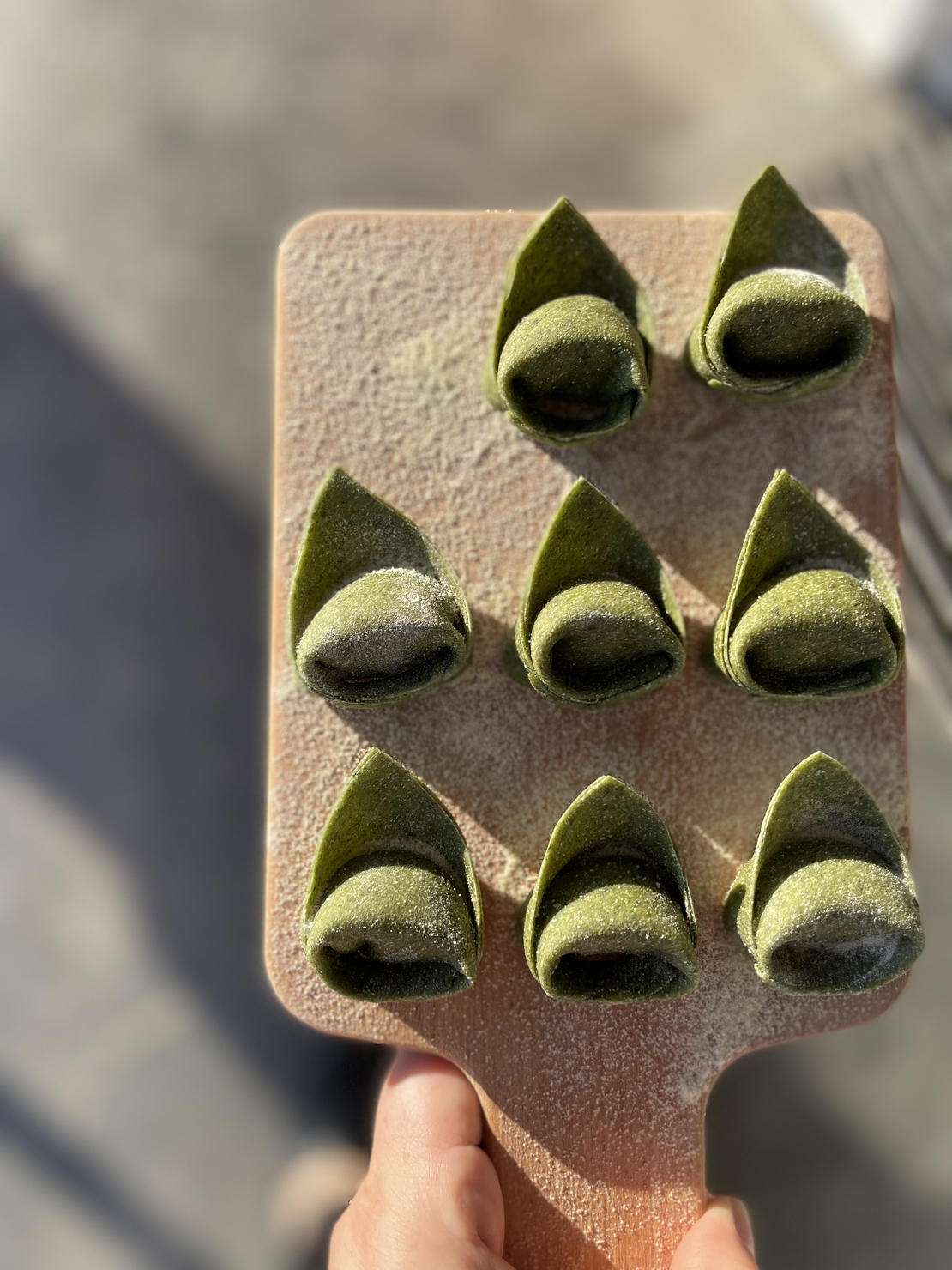 טורטליני ירוק עם דלעת חריפה ורוקפור